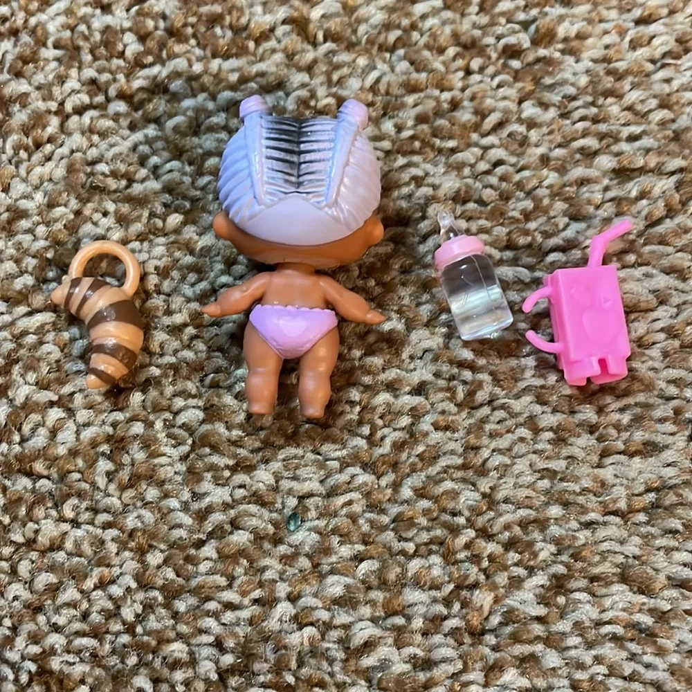 L O L Mini doll Purple Corn Rows